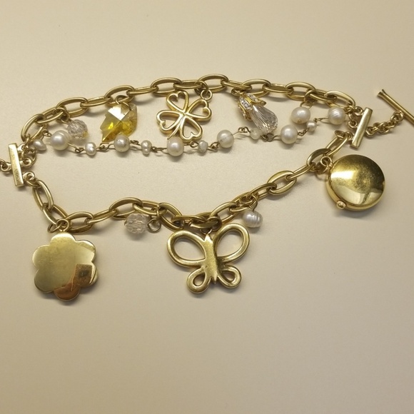 Gold charm bracelet with watch. - Picture 5 of 6